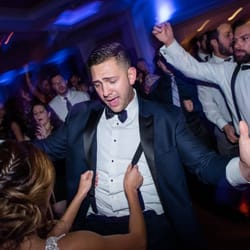 DLE Event Group - Packed dance floor around the bride and groom! Wedding DJ company for #TontyAndBobby at Fox Hollow Country Club in Long Island, New York.