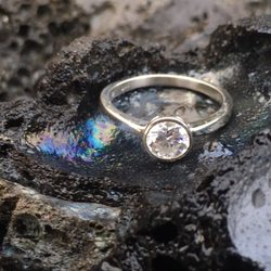 The engagement ring in a lava bubble after we got engaged in Hawaii at Volcano National Park.