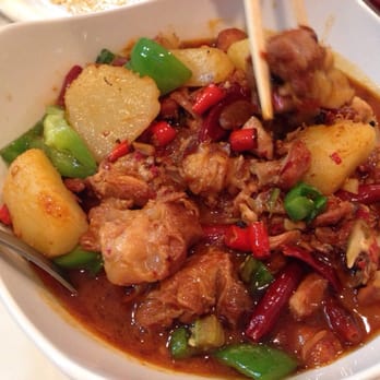 Xin Jiang BBQ - Big plate chicken served with thick noodles. Eat the noodles with the chicken sauce! - Barbeque Near Me - Houston, Texas
