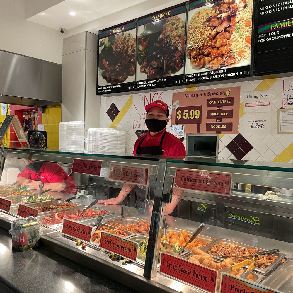 a man in a mask behind the counter a man in a mask behind the counter