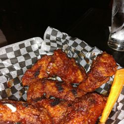 The Crooked Uncle - Enjoying some massive wings.