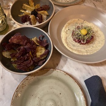 FIG Restaurant - Caviar and chips (top left) and Wagyu beef with chips (right and bottom left) - Bars Near Me - Santa Monica, California FIG Restaurant - Caviar and chips (top left) and Wagyu beef with chips (right and bottom left) - Bars Near Me - Santa Monica, California