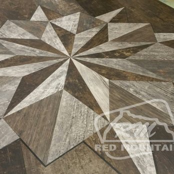Robison Design Flooring - a wood floor with a star design - Flooring Near Me - Idaho Falls, Idaho Robison Design Flooring - a wood floor with a star design - Flooring Near Me - Idaho Falls, Idaho