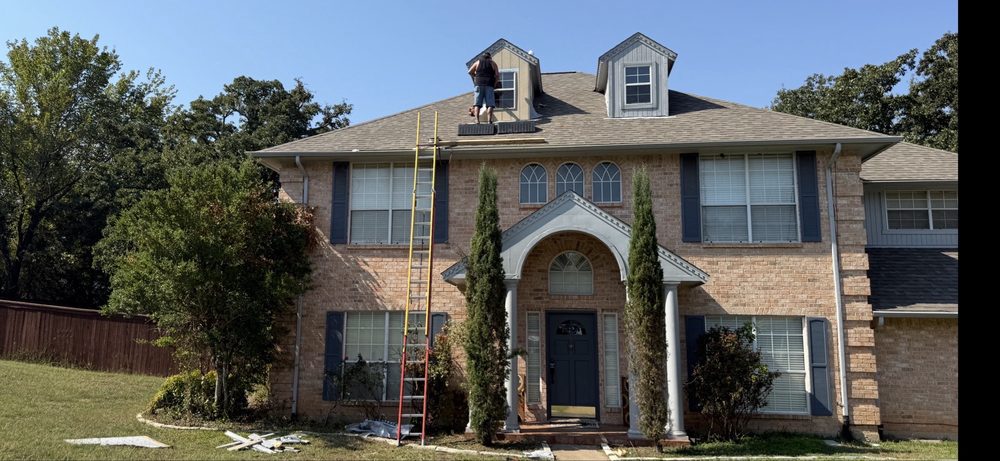 Slide of Mike and Mike Roofing
