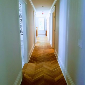 Villa Construction & Development - a hallway leading to a bathroom - General Contractors Near Me - Schiller Park, Illinois
