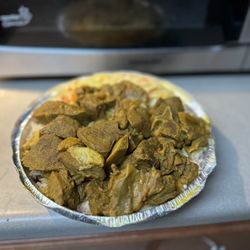 People's Choice Jamaican American Restaurant - Curry Goat, rice, beans and veggies (cabbage). It was also advertised with plantains but I didn't get them, not sure if that was an error)