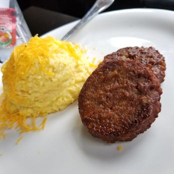 Hudson - Cheese grits and sausage patties - New American Near Me - Seattle, Washington