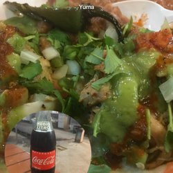 Corona's Tacos - All the meat is grilled on a wood fire ... fresh fixings top-your-own tacos