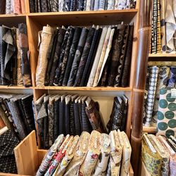Dragon Mama Futon Shop - Fabrics section put by styles