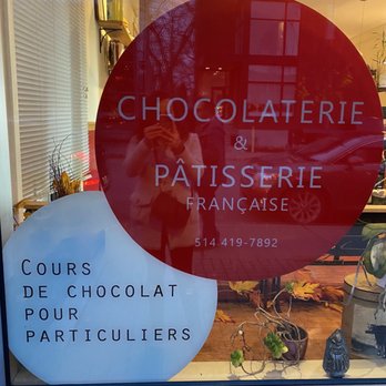 Chocolaterie Bonneau - a sign in a shop window - Creperies Near Me - Montreal, Quebec Chocolaterie Bonneau - a sign in a shop window - Creperies Near Me - Montreal, Quebec