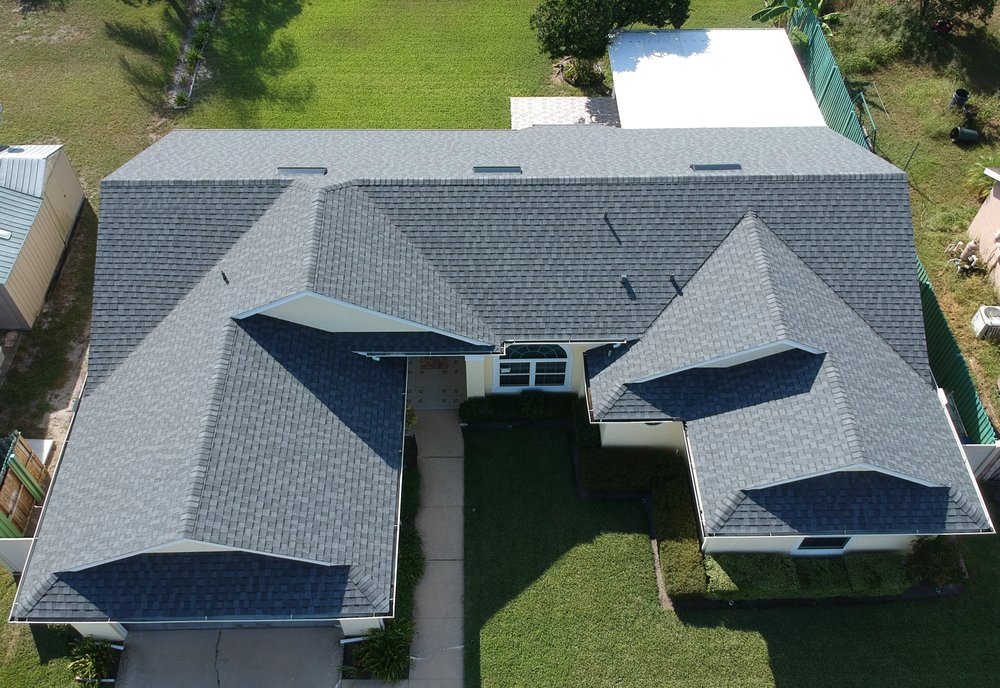 Slide of One World Roofing