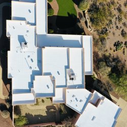 WolfPack Contractors - Highly reflective roof sealant, prolongs roof life and increases home efficiency.