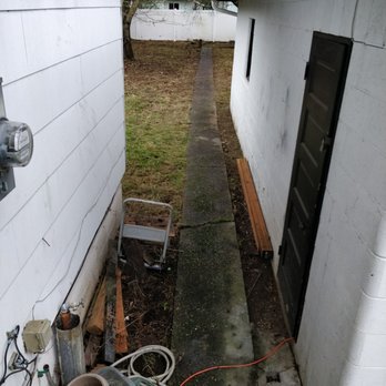 Seahawk Lawn Service - This pathway was totally over grown. - Landscaping Near Me