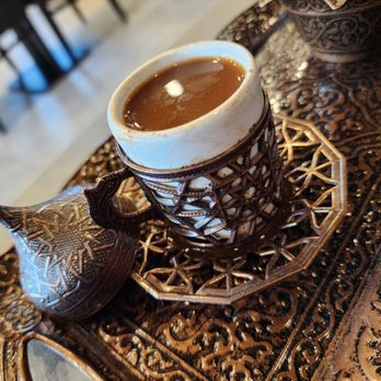Loveis - a cup of coffee on a table - Cafes Near Me - North York, Ontario Loveis - a cup of coffee on a table - Cafes Near Me - North York, Ontario