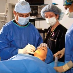 Obi Plastic Surgery Clinic - Dr. Lewis Obi and his exceptional OR team.