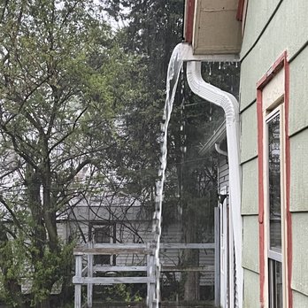 R&k gutters - Rain pouring out of the gutter - Gutter Services Near Me R&k gutters - Rain pouring out of the gutter - Gutter Services Near Me