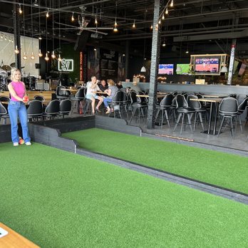 Steel Valley Brew Works - a woman in a pink shirt and jeans - Coffee & Tea Near Me - Youngstown, Ohio