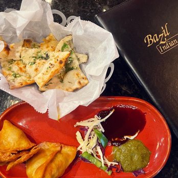 Bazil Indian Cuisine - Vegetable Samosa and Garlic Naan - Indian Near Me - Raleigh, North Carolina Bazil Indian Cuisine - Vegetable Samosa and Garlic Naan - Indian Near Me - Raleigh, North Carolina