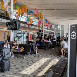 Delta Air Lines - Seating area for gates 80, 82 at Montreal airport (YUL). Delta gates.