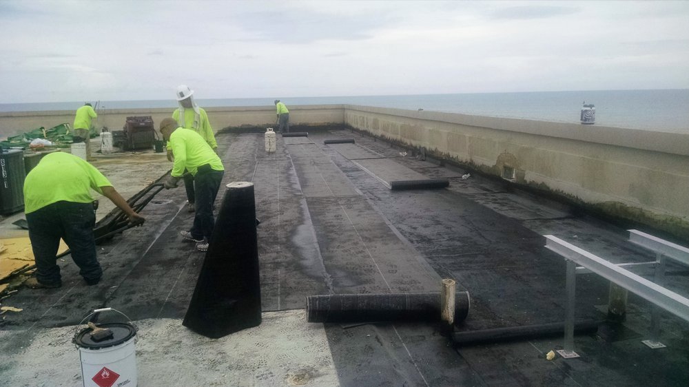 Slide of Bel-Mac Roofing