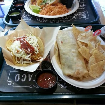 Rubio's Coastal Grill - Regular Fish Taco (left) bomb smoked blackened salmon(right) - Mexican Near Me - Orange, California Rubio's Coastal Grill - Regular Fish Taco (left) bomb smoked blackened salmon(right) - Mexican Near Me - Orange, California