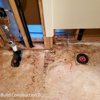 Best Build Construction - a view of a bathroom with a hole in the floor - General Contractors Near Me - Vancouver, Washington
