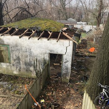 GO4 Junk Removal - Start of garage demolition. Removing roof by hand. - Demolition Services Near Me GO4 Junk Removal - Start of garage demolition. Removing roof by hand. - Demolition Services Near Me