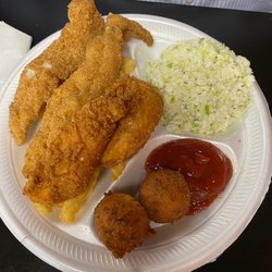 Swamp John's Restaurant & Catering - Fried catfish fillets, chicken tenders, coleslaw, fries and hush puppies