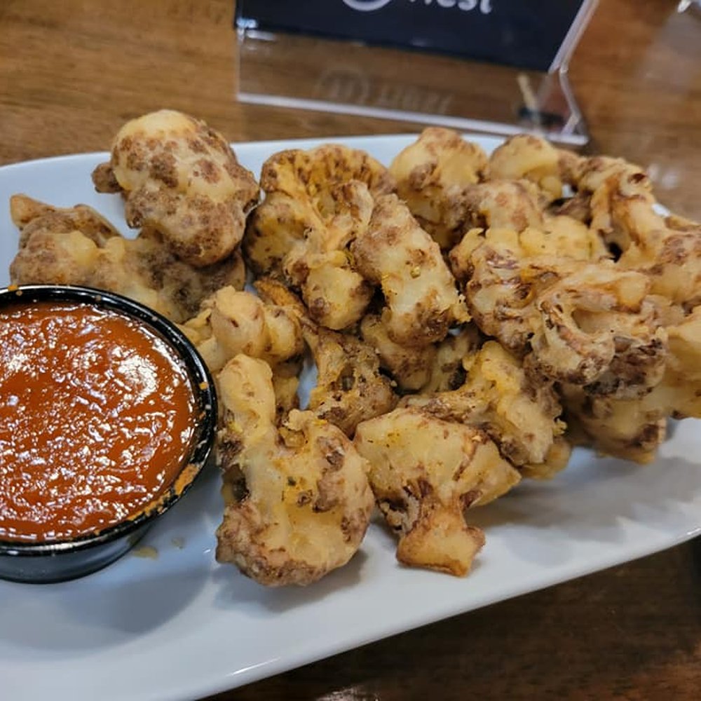 Nest Taphouse Grill - a plate of fried food - Music Venues Near Me - Edmonton, Alberta Nest Taphouse Grill - a plate of fried food - Music Venues Near Me - Edmonton, Alberta