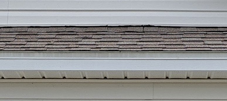 Slide of Bowles Roofing