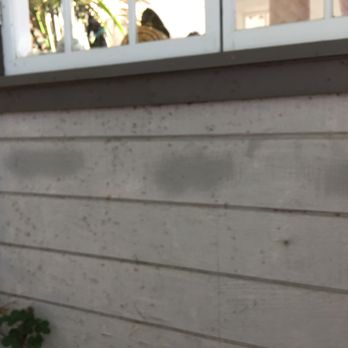 Bug Crashers Termite & Pest Control - i asked them to return and fix the splotches on the house. they removed two, but left these (and maybe more) - Pest Control Near Me