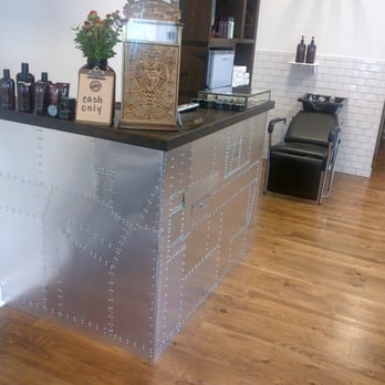The Barbers - Owner Took an airplane wing and made the checkout area - Barbers Near Me - Highland Park, Illinois The Barbers - Owner Took an airplane wing and made the checkout area - Barbers Near Me - Highland Park, Illinois