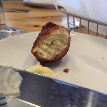Poseidon - The hush puppy basket holds about 8 and comes with honey butter - Seafood Near Me - Hilton Head Island, South Carolina Poseidon - The hush puppy basket holds about 8 and comes with honey butter - Seafood Near Me - Hilton Head Island, South Carolina