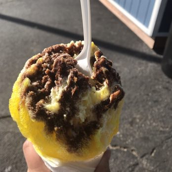 Yeti's Shaved Ice - Banana with cream topping and chocolate drizzle. - Shaved Ice Near Me - Eureka, Missouri Yeti's Shaved Ice - Banana with cream topping and chocolate drizzle. - Shaved Ice Near Me - Eureka, Missouri