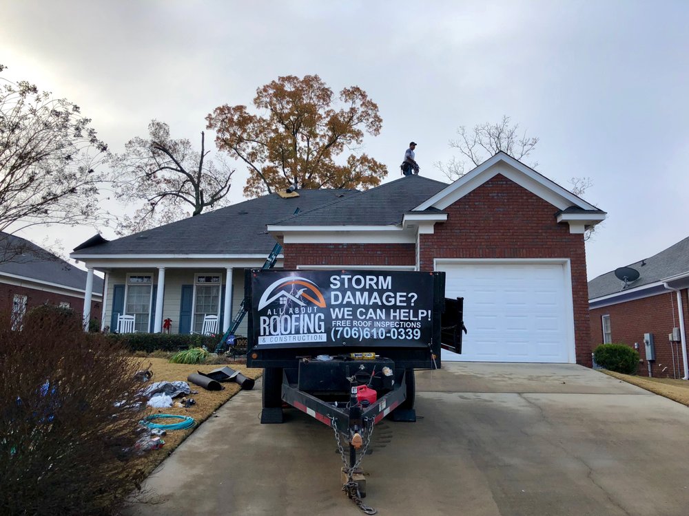 Slide of All About Roofing & Construction