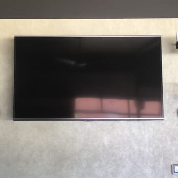 Premiere TV - 80" Sharp mounted on an articulating mount at Dukes Upper Deck. - Home Theatre Installation Near Me Premiere TV - 80" Sharp mounted on an articulating mount at Dukes Upper Deck. - Home Theatre Installation Near Me