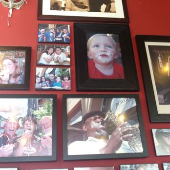 Powderface - Inside - Powdered Sugar Faces Line the Wall - Coffee & Tea Near Me - Oakland, California