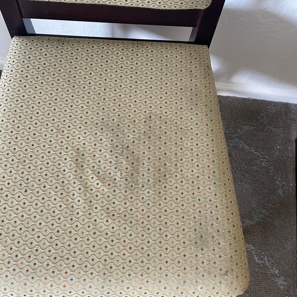 Forest Villas Hotel - Stained chair. - Hotels Near Me - Prescott, Arizona