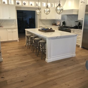 Carpet Land Flooring Center - a kitchen with hardwood floors - Carpeting Near Me - Northridge, California