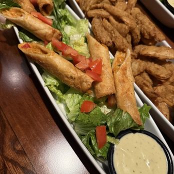 LongHorn Steakhouse - Firecracker Chicken Wraps Texas Tonion - American Near Me - Henderson, Nevada LongHorn Steakhouse - Firecracker Chicken Wraps Texas Tonion - American Near Me - Henderson, Nevada