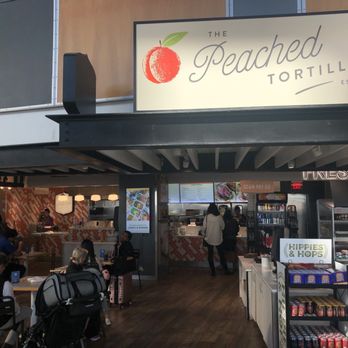 The Peached Tortilla - The outside of the restaurant. There are only four tables inside, but plenty of eating outside the restaurant. - Tacos Near Me - Austin, Texas The Peached Tortilla - The outside of the restaurant. There are only four tables inside, but plenty of eating outside the restaurant. - Tacos Near Me - Austin, Texas