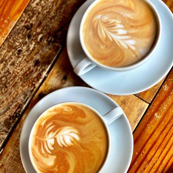 Twenty Below Coffee - two cups of coffee on a wooden table - Coffee & Tea Near Me - Fargo, North Dakota Twenty Below Coffee - two cups of coffee on a wooden table - Coffee & Tea Near Me - Fargo, North Dakota