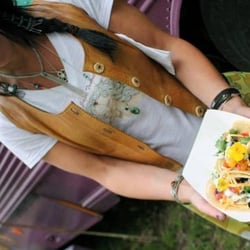 Jupiter Jane Traveling Cafe - Chef and owner, Laura, displaying one of our many taco items!