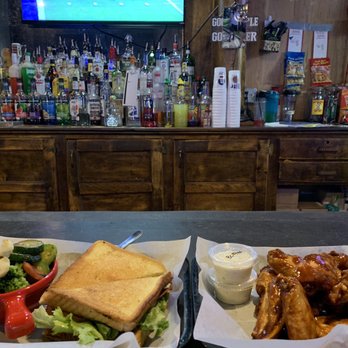 Burly-N-Bucks - The BLT with grilled veggies and a dozen wings - Bars Near Me - Osseo, Wisconsin Burly-N-Bucks - The BLT with grilled veggies and a dozen wings - Bars Near Me - Osseo, Wisconsin