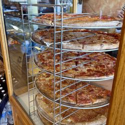 Stack of Freshly Made Pizza