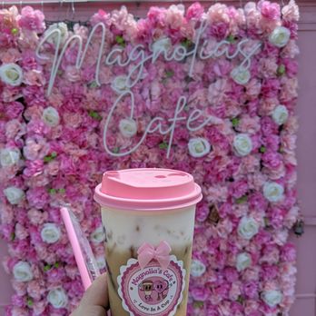 Magnolia's Cafe - The Magdelena half sweet in front of the flower wall - Coffee & Tea Near Me - High Point, North Carolina Magnolia's Cafe - The Magdelena half sweet in front of the flower wall - Coffee & Tea Near Me - High Point, North Carolina