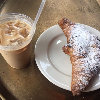 Armistice Coffee Roaster - Iced latte and almond croissant - Coffee Roasteries Near Me - Seattle, Washington