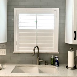 Shutters Incorporated - Shutters mounted on glass tile backsplash