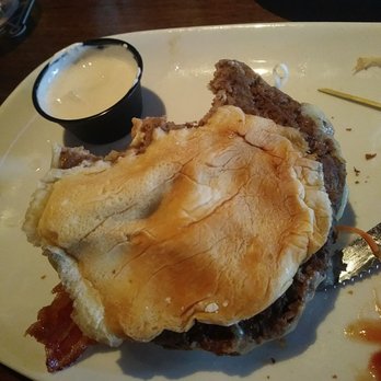 The Pour House - The swine time burger. Basically a 50 cent patty slapped on a 15 cent store bought bun with some sauce, tough piece of pork, and some slaw - American Near Me - Exton, Pennsylvania The Pour House - The swine time burger. Basically a 50 cent patty slapped on a 15 cent store bought bun with some sauce, tough piece of pork, and some slaw - American Near Me - Exton, Pennsylvania