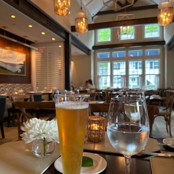 Sandbar - a glass of beer and a glass of wine on a table - Bars Near Me - Cold Spring Harbor, New York Sandbar - a glass of beer and a glass of wine on a table - Bars Near Me - Cold Spring Harbor, New York